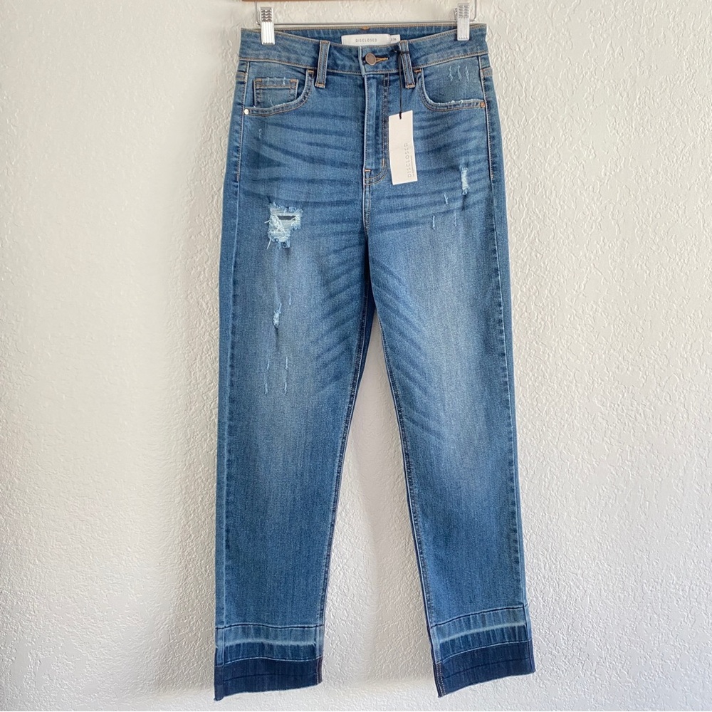 Disclosed high rise straight crop jeans